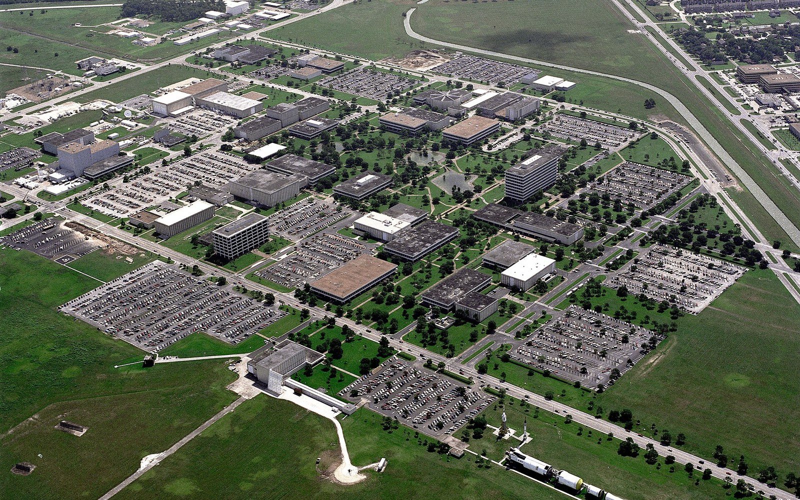 An aerial view of the Johnson Space Center campus at Houston, its buildings laid out on a grid
