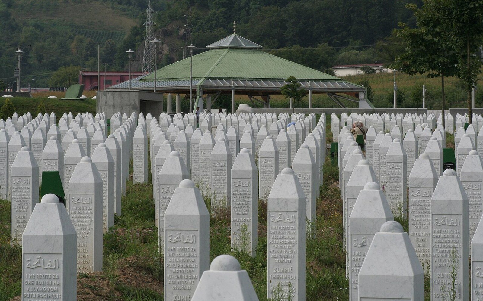 Rows of white grave markers at the Srebrenica memorial centre at Potocari