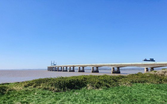 A road bridge crossing the Severn estuary on a clear day