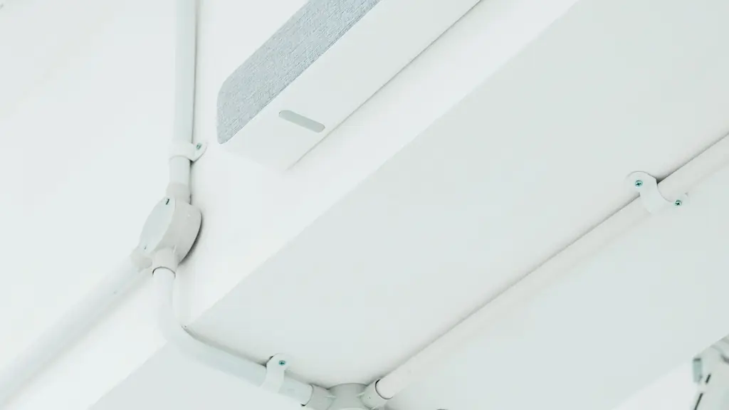 White painted services and brackets fixed to a white soffit