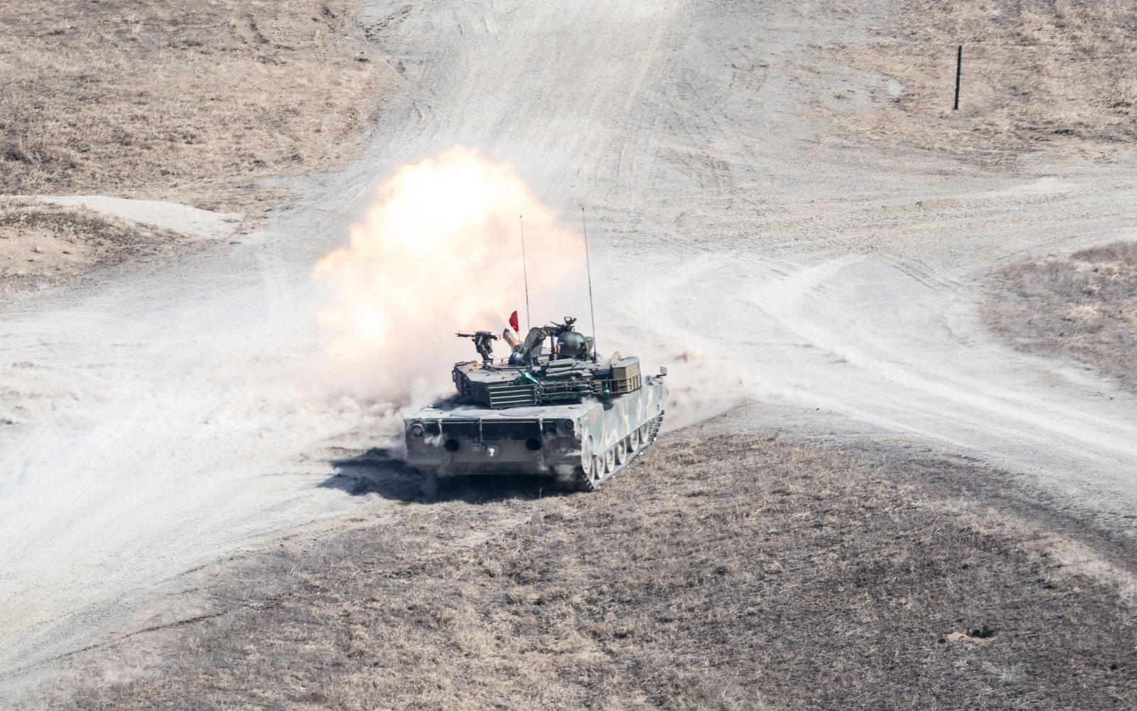 A Republic of Korea Army K2 tank fires its main gun during a live fire exercise
