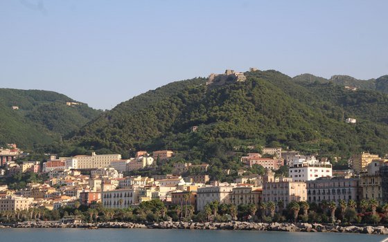 A coastal town below wooded hills on the Salerno coastline